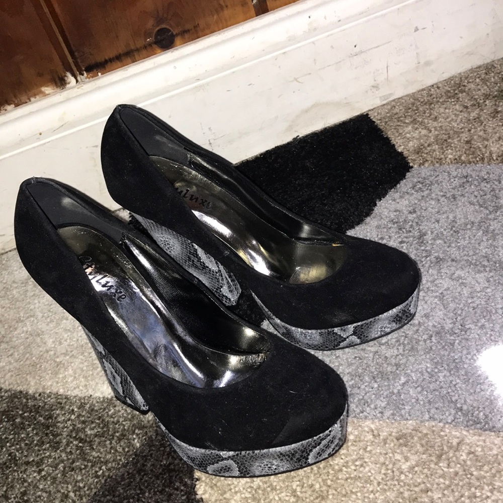 Black heels with snake skin